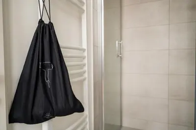 Ein Badezimmer in der Unterkunft Homaris Rummelsburg Studios
