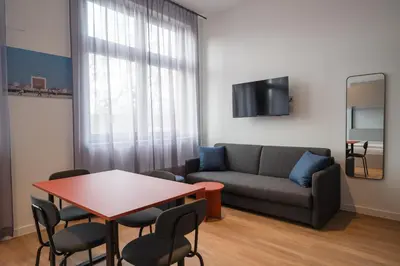 Ein Sitzbereich in der Unterkunft Homaris Rummelsburg Studios