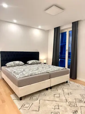 Ein Bett oder Betten in einem Zimmer der Unterkunft Traumhaft großes Apartment im Herzen Berlins