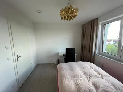 Ein Bett oder Betten in einem Zimmer der Unterkunft Premium and city close, Top transport links