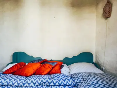 Ein Bett oder Betten in einem Zimmer der Unterkunft Sanssouci Park Villa