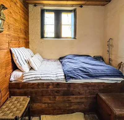 Ein Bett oder Betten in einem Zimmer der Unterkunft Sanssouci Park Villa