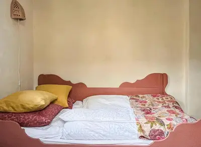 Ein Bett oder Betten in einem Zimmer der Unterkunft Sanssouci Park Villa
