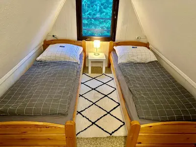 Ein Bett oder Betten in einem Zimmer der Unterkunft Finnhütte Louise am Storkower See