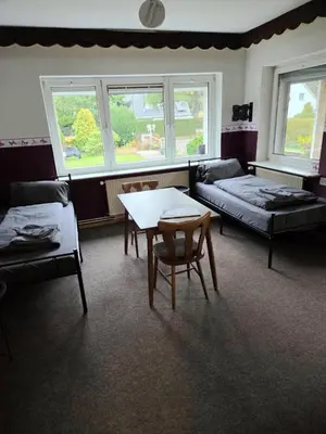 Ein Bett oder Betten in einem Zimmer der Unterkunft Monteur-Haus Lübeck Berlin Pankow, Reinickendorf, Glienicke-Nordbahn