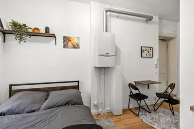 Ein Bett oder Betten in einem Zimmer der Unterkunft Cosy mini-appartment in Prenzlauer Berg