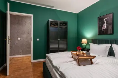 Ein Bett oder Betten in einem Zimmer der Unterkunft FABEL Apartments am Hbf