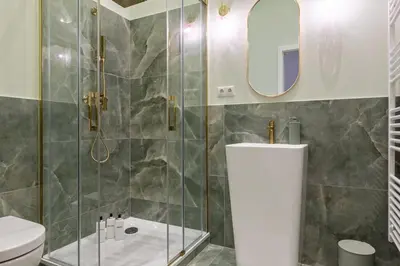 Ein Badezimmer in der Unterkunft FABEL Apartments am Hbf