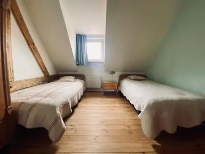 Ein Bett oder Betten in einem Zimmer der Unterkunft Urlaubsidylle Friedrichswalde