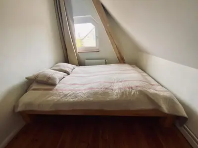 Ein Bett oder Betten in einem Zimmer der Unterkunft Urlaubsidylle Friedrichswalde