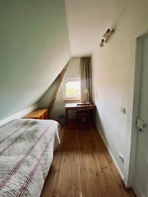 Ein Bett oder Betten in einem Zimmer der Unterkunft Urlaubsidylle Friedrichswalde