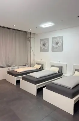 Ein Bett oder Betten in einem Zimmer der Unterkunft Urban Eastside Apartment - Berlin Friedrichshain near Ostkreuz