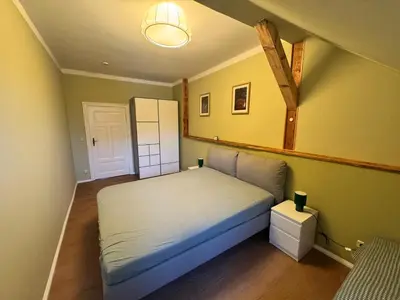 Ein Bett oder Betten in einem Zimmer der Unterkunft Altstadt Quartier 2