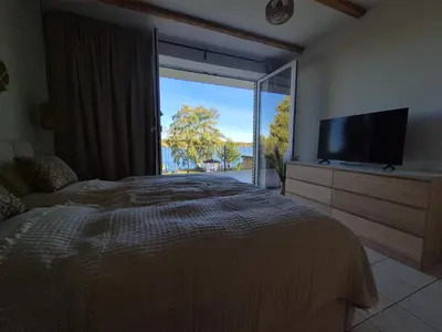 Ein Bett oder Betten in einem Zimmer der Unterkunft Monteurzimmer 6 mit Seeblick