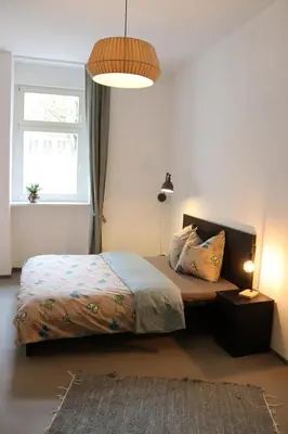 Ein Bett oder Betten in einem Zimmer der Unterkunft La Maisonnette - le grand appart