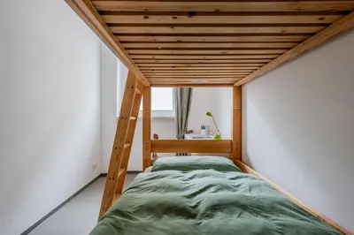 Ein Bett oder Betten in einem Zimmer der Unterkunft La Maisonnette - le grand appart