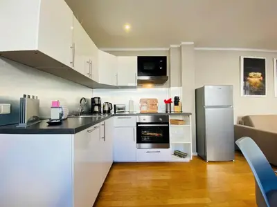 Küche/Küchenzeile in der Unterkunft Amaroo - Serviced Apartments 