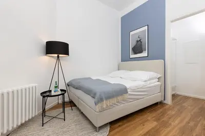 Ein Bett oder Betten in einem Zimmer der Unterkunft Modernes Apartment mit zwei Bädern