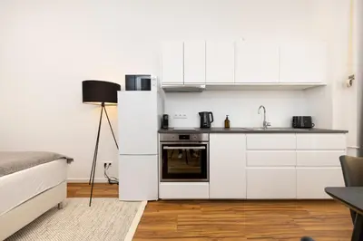 Küche/Küchenzeile in der Unterkunft Modernes Apartment mit zwei Bädern