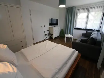 Ein Bett oder Betten in einem Zimmer der Unterkunft Ferienhaus direkt an der Spree