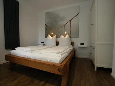 Ein Bett oder Betten in einem Zimmer der Unterkunft Ferienhaus direkt an der Spree
