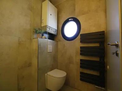 Ein Badezimmer in der Unterkunft Ferienhaus direkt an der Spree