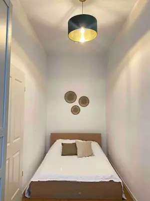 Ein Bett oder Betten in einem Zimmer der Unterkunft Berlin Base Apartments