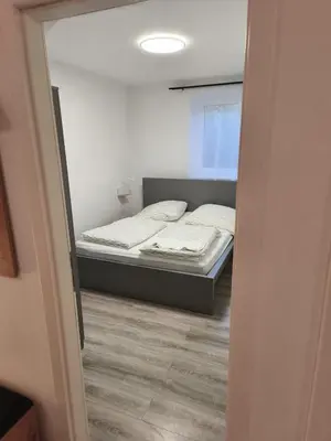 Ein Bett oder Betten in einem Zimmer der Unterkunft NicePlace4You Maxi