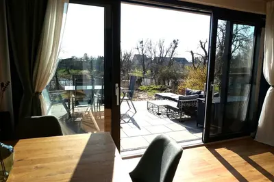 Ein Sitzbereich in der Unterkunft Haus am Fluss