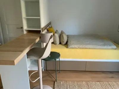 Ein Bett oder Betten in einem Zimmer der Unterkunft Apartment mit Garten - Garden view