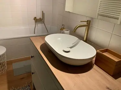 Ein Badezimmer in der Unterkunft Apartment mit Garten - Garden view