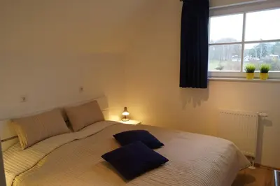 Ein Bett oder Betten in einem Zimmer der Unterkunft Premium Apartments