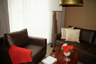 Ein Sitzbereich in der Unterkunft Premium Apartments