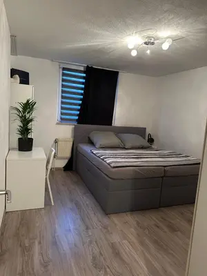 Ein Bett oder Betten in einem Zimmer der Unterkunft Jonas Haus Gästezimmer