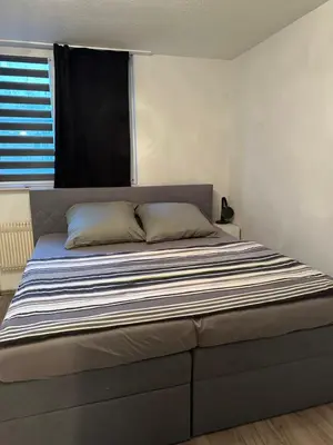 Ein Bett oder Betten in einem Zimmer der Unterkunft Jonas Haus Gästezimmer