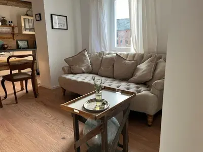 Ein Sitzbereich in der Unterkunft Sauna Suite Schwante mit Klavier