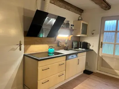 Küche/Küchenzeile in der Unterkunft Sauna Suite Schwante mit Klavier