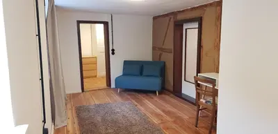 Ein Sitzbereich in der Unterkunft Altes Fischerhaus Zehdenick - Ferienhaus an der Havel