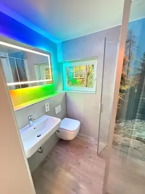 Ein Badezimmer in der Unterkunft Chalet im Wald mit Sauna