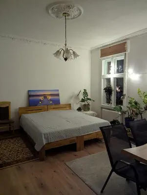 Ein Bett oder Betten in einem Zimmer der Unterkunft FeWo Auguststraße
