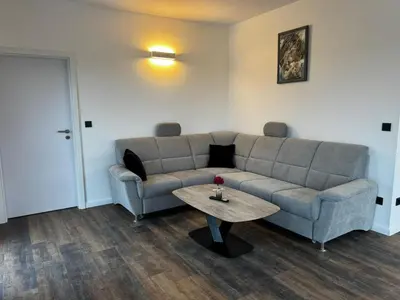 Ein Sitzbereich in der Unterkunft East-Riverside Boardinghouse