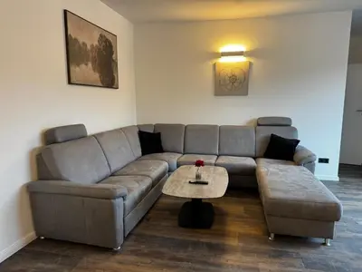 Ein Sitzbereich in der Unterkunft East-Riverside Boardinghouse
