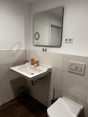 Ein Badezimmer in der Unterkunft East-Riverside Boardinghouse