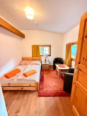 Ein Bett oder Betten in einem Zimmer der Unterkunft Privates Ferienhaus mit großem Garten