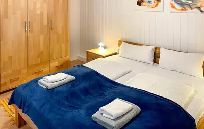 Ein Bett oder Betten in einem Zimmer der Unterkunft Am Weidenbaum
