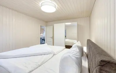 Ein Bett oder Betten in einem Zimmer der Unterkunft Haus Aliyah