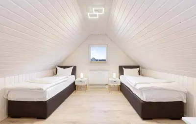 Ein Bett oder Betten in einem Zimmer der Unterkunft Haus Aliyah
