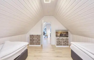 Ein Bett oder Betten in einem Zimmer der Unterkunft Haus Aliyah