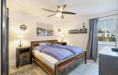 Ein Bett oder Betten in einem Zimmer der Unterkunft Haus Ankerplatz