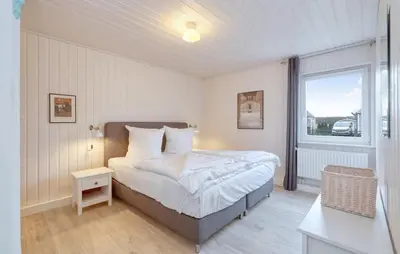 Ein Bett oder Betten in einem Zimmer der Unterkunft Haus Charlotte